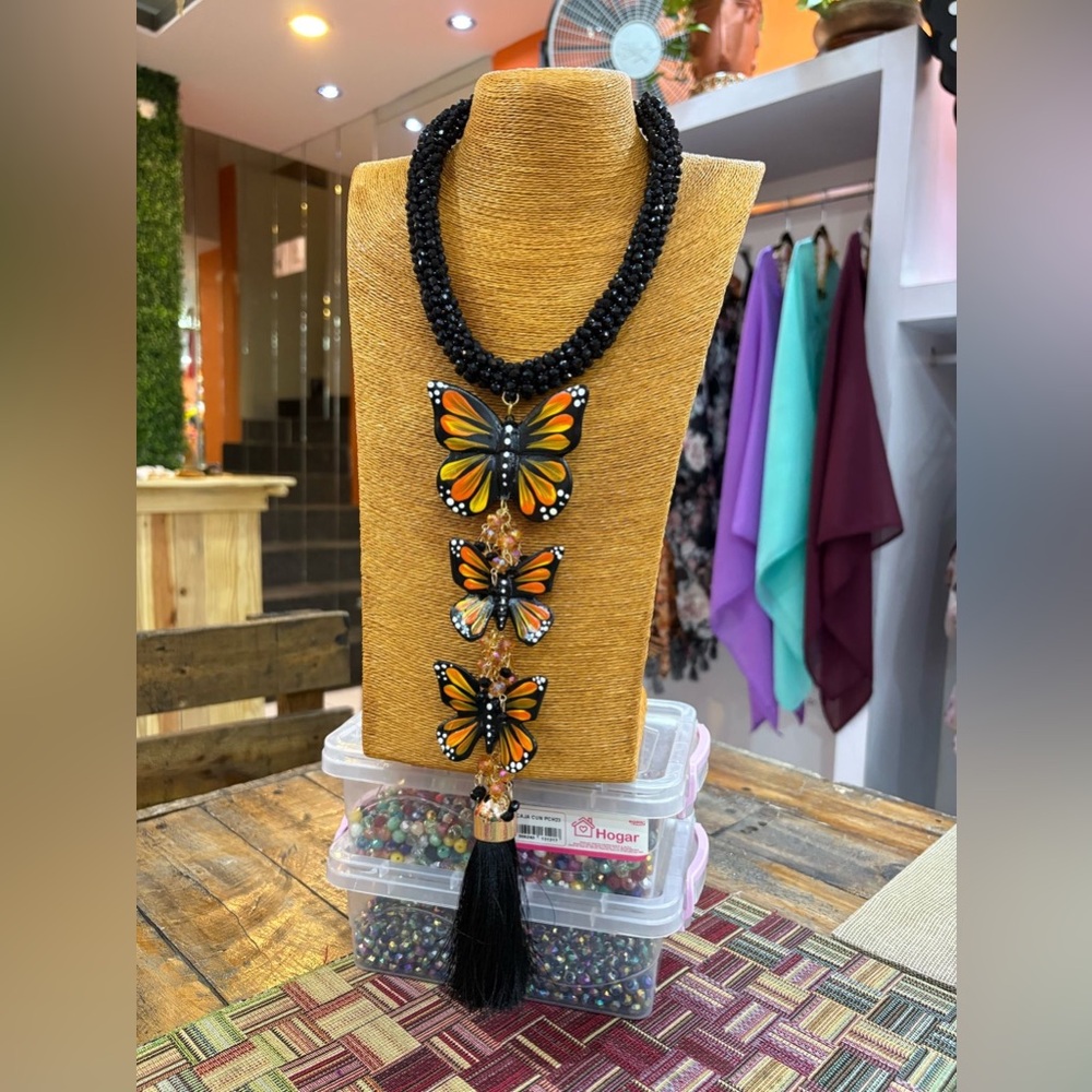 Black Beaded Necklace with Orange Butterfly Pendants